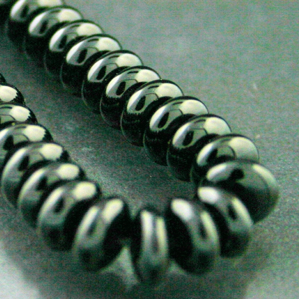Onyxstrang, ca. 46 cm lang, rondellform, 8 mm D.