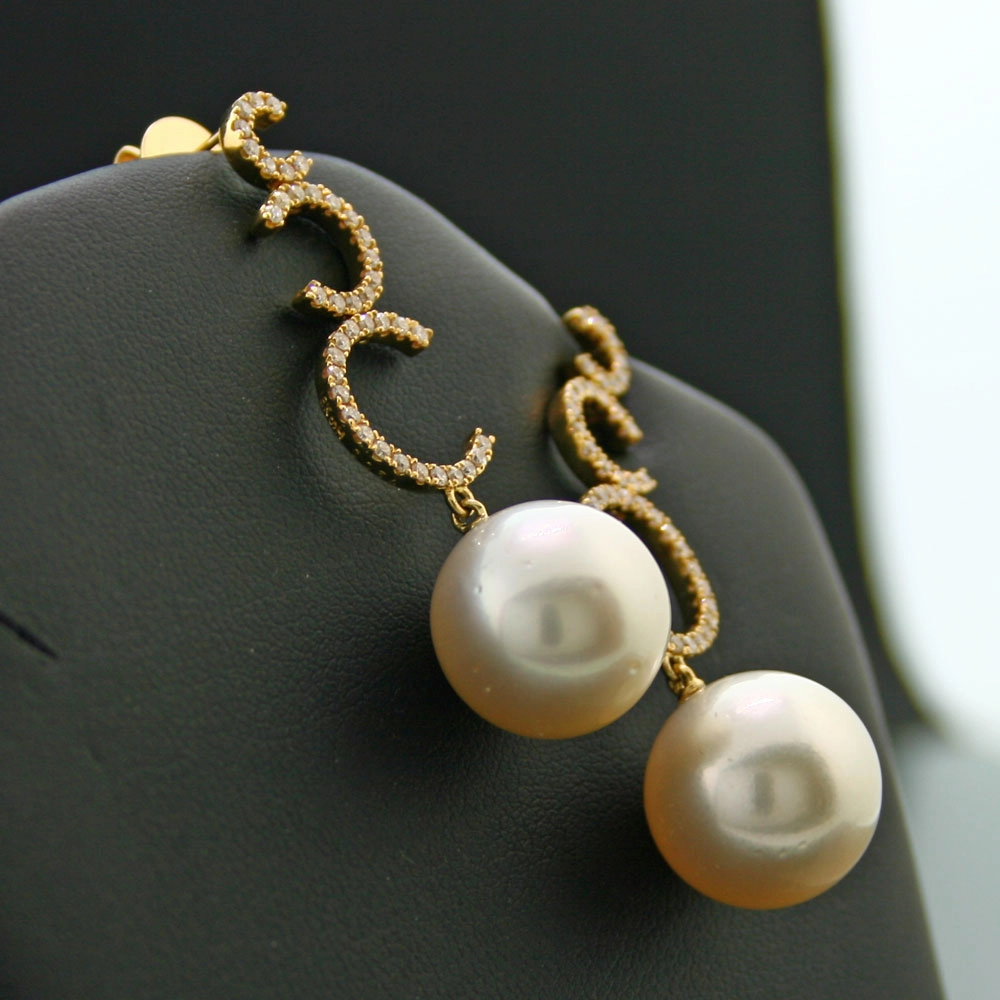 Brillant-Südsee-Ohrstecker, 750/-GG.