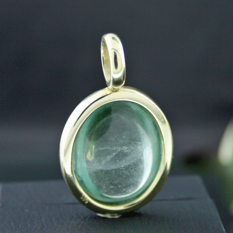 Aquamarincabochon-Anhänger, 585/-GG.