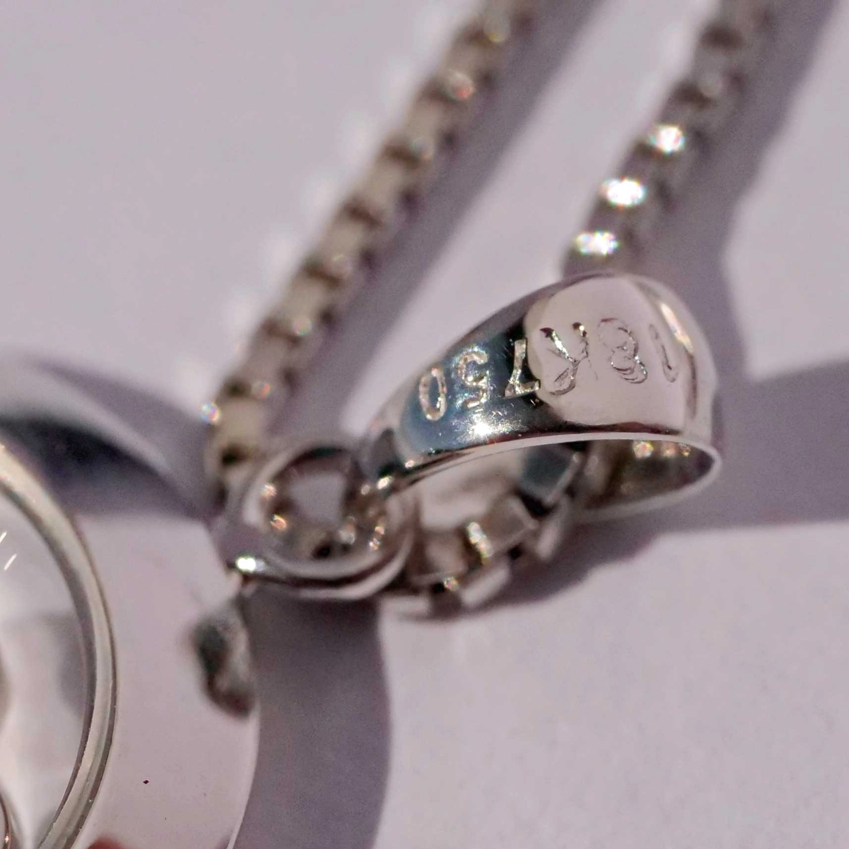 Anhänger mit beweglichen Brillanten in 750er Weissgold mit Kette in 333er Weissgold