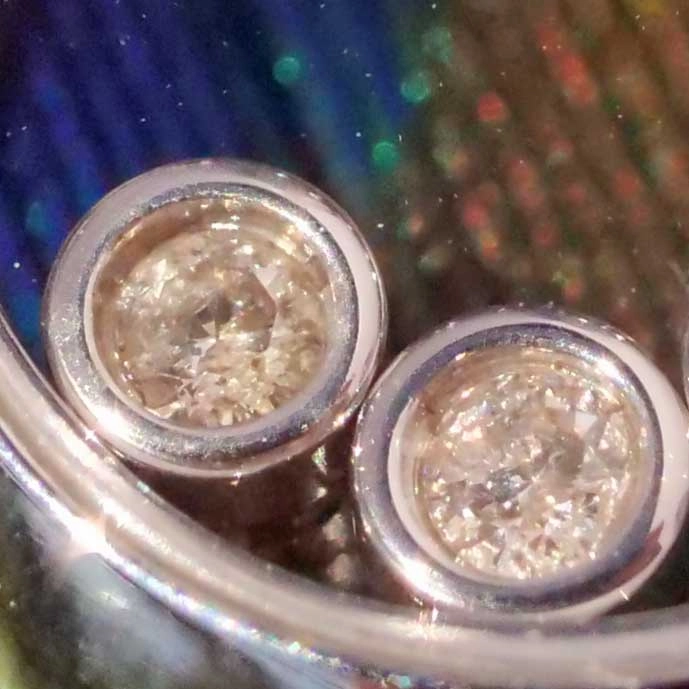 Anhänger mit beweglichen Brillanten in 750er Weissgold mit Kette in 333er Weissgold
